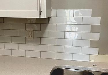 Kitchen backsplash tile kit includes maintenance-free panels and everything you 