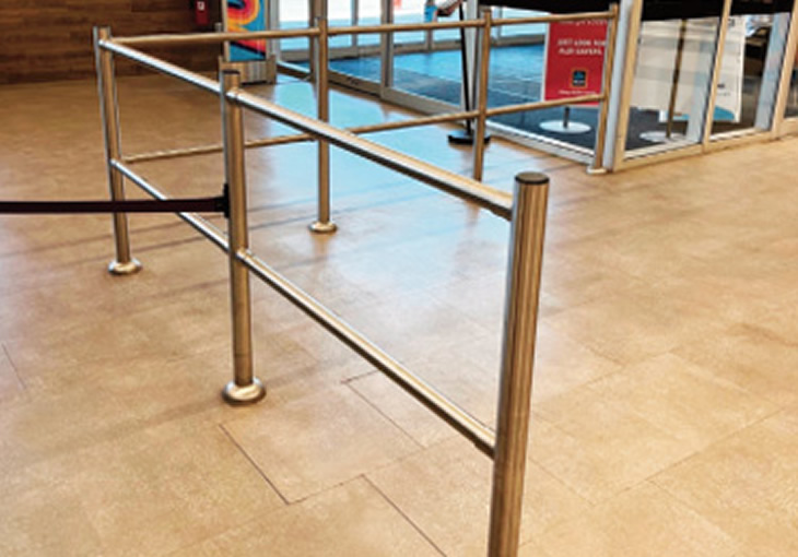 Modular rail system in brushed stainless steel guides customers in the store
